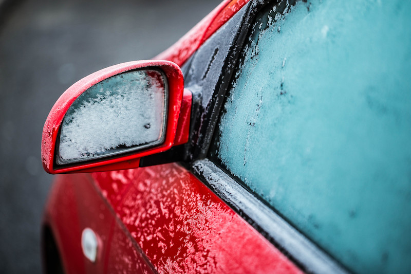 frost on red car